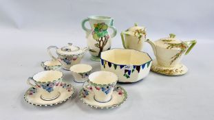 A CROWN DEVON FIELDING'S PART TEA SERVICE, DECORATED WITH BLUE, PINK AND MAUVE FLOWERS,