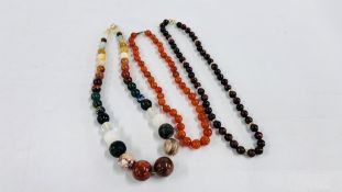 A LARGE AGATE NECKLACE PLUS A TIGERS EYE AND A CARNELIAN NECKLACE.