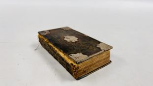 AN ANTIQUE WHITE METAL BOUND PRAY BOOK: THE BOOK OF COMMON-PRAYER AND ADMINISTRATION OF THE