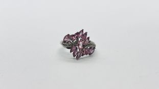 A MODERN DESIGNER SILVER CLUSTER RING SET WITH PINK SAPPHIRE AND DIAMONDS (WITH A COPY OF APPRAISER