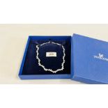 A DESIGNER EVENING CHOKER STYLE NECKLACE MARKED "SWAROVSKI" IN FITTED BOX.
