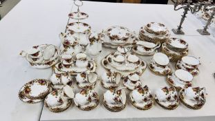 AN EXTENSIVE COLLECTION OF OLD ROYAL ALBERT COUNTRY ROSES TEA AND DINNERWARE TO INCLUDE TEA AND