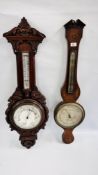 AN ORNATE PERIOD MAHOGANY MOUNTED ANAROID WALL BAROMETER ALONG WITH A FURTHER ANTIQUE MERCURY