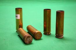 A GROUP OF 5 ANTIQUE BRASS SHELLS STAMPED 805 CY 84 PRAC 4Z,
