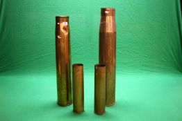 FOUR BRASS AMO SHELLS, VARIOUS SIZES,