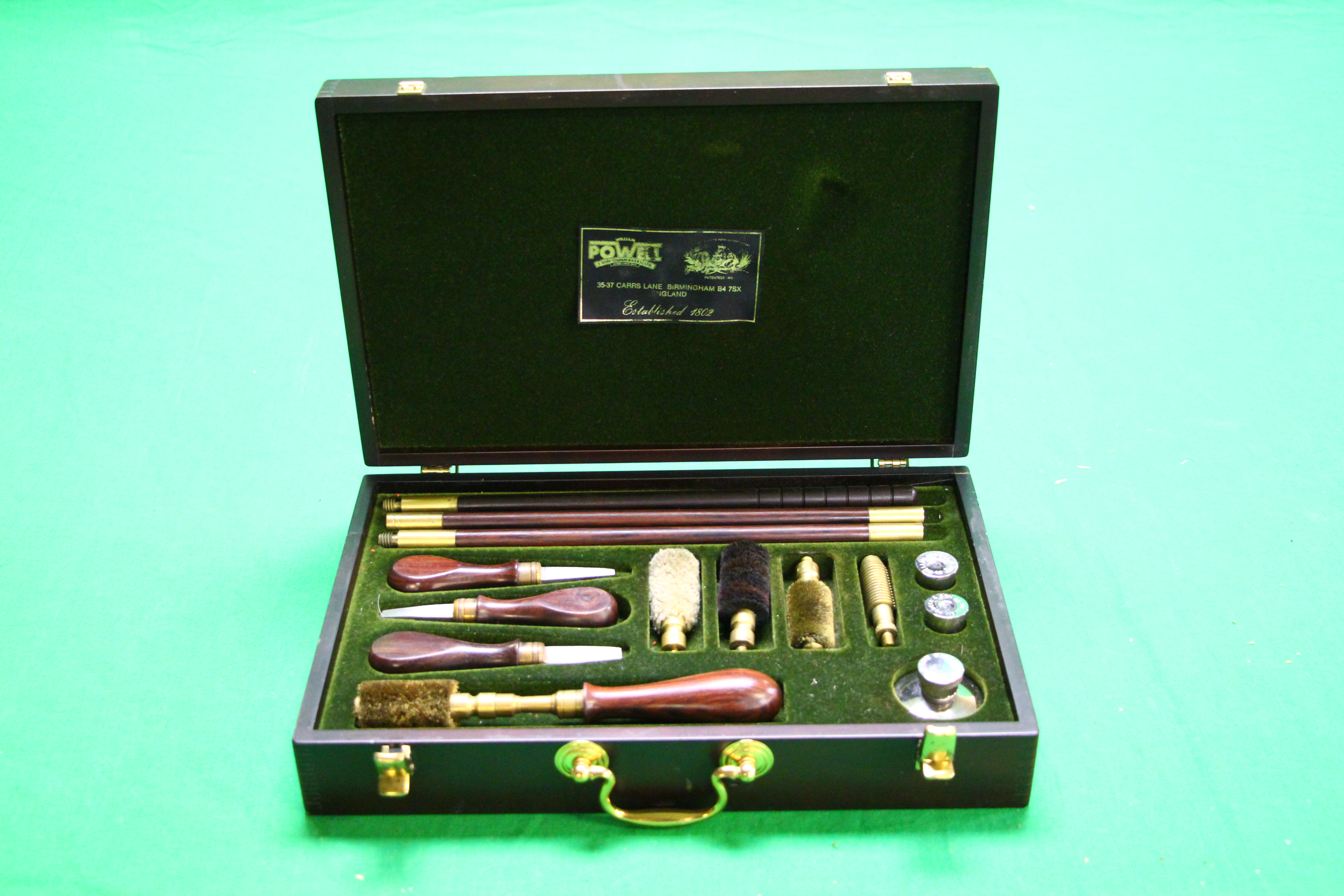 A WILLIAM POWELL CASED 12 GAUGE GUN CLEANING KIT AND ACCESSORIES