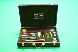 A WILLIAM POWELL CASED 12 GAUGE GUN CLEANING KIT AND ACCESSORIES