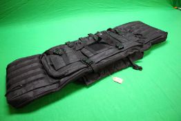 A BLACK TACTICAL GUN BAG