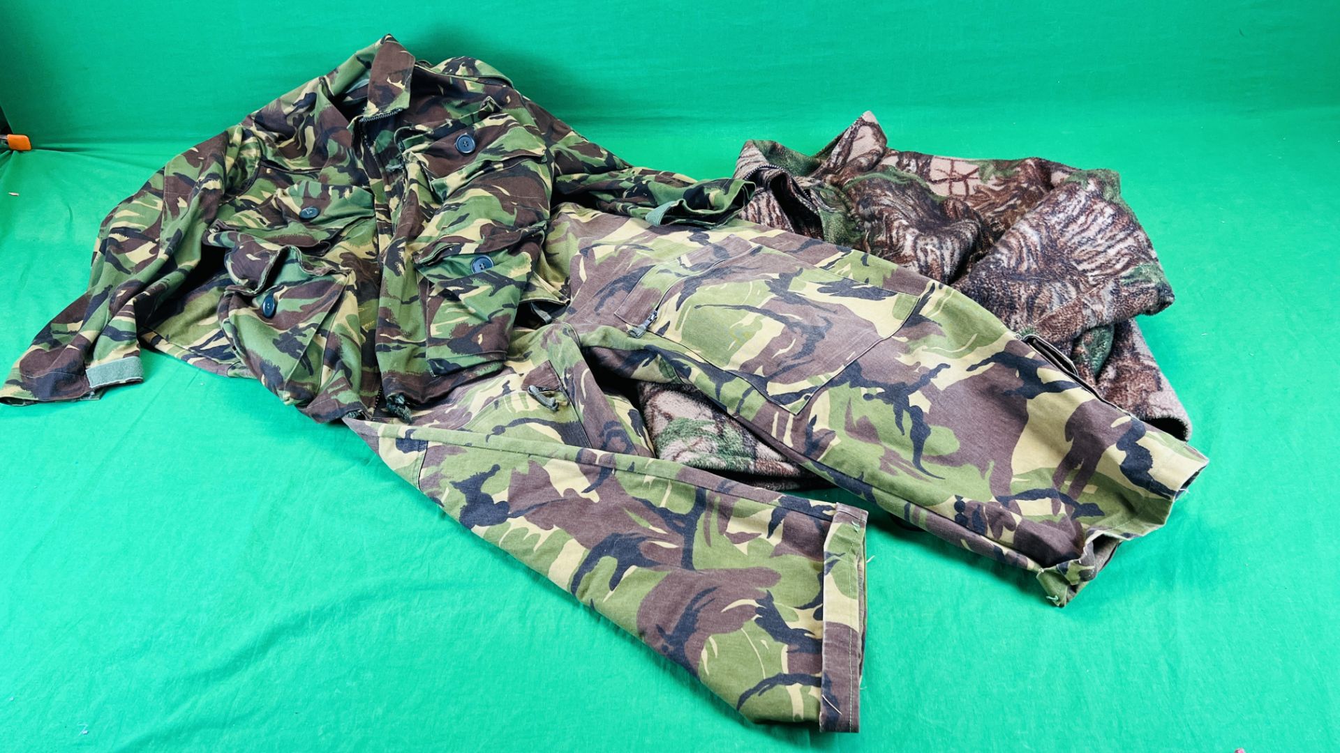 AN AMERICAN WHITETAIL XL CAMO JACKET, KLM CAMO OVERALLS,