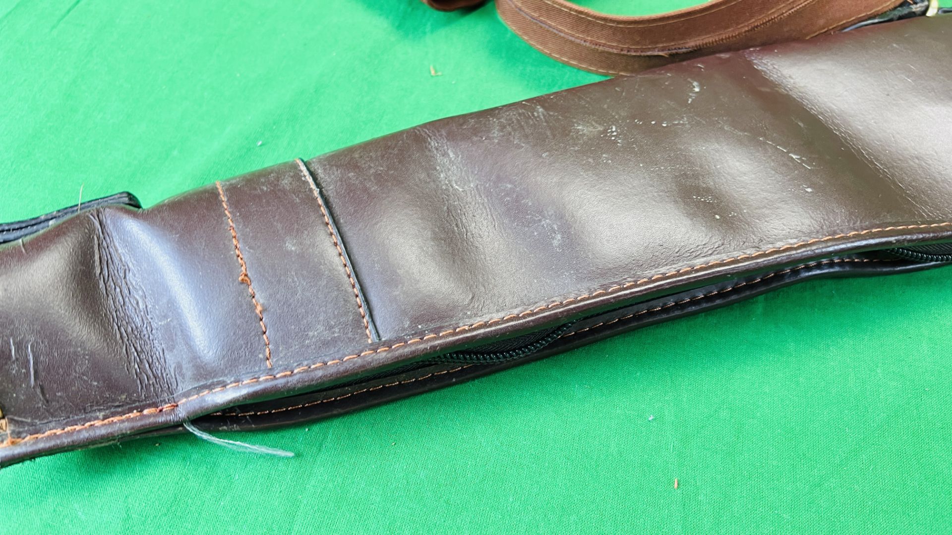 A GOOD QUALITY BROWN LEATHER SHOTGUN SLIP ALONG WITH LINDOP CANVAS SHOTGUN SLIP, - Image 7 of 7