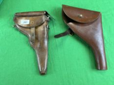 TWO ANTIQUE LEATHER PISTOL HOLSTERS