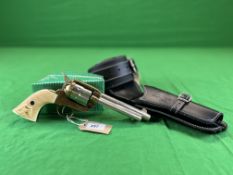 A REPLICA DENIX COLT PEACEMAKER SIX SHOT REVOLVER COMPLETE WITH LEATHER HOLSTER - NO POSTAGE OR