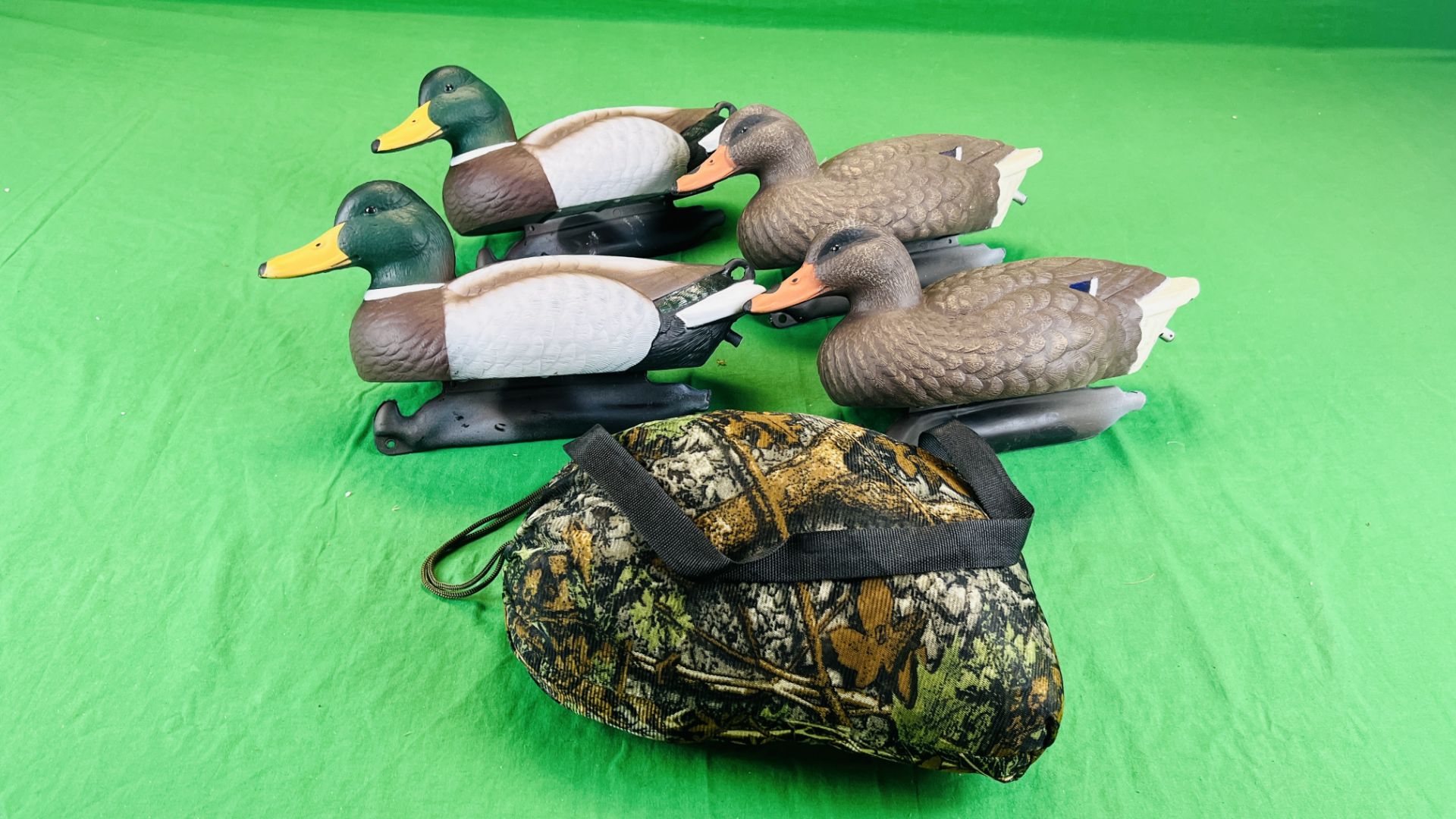 4 FULL BODY FLOATING DECOY DUCKS AND CAMO NET