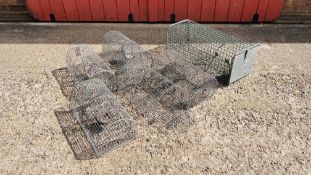 THREE DOME TOP WIRE CAGE HUMANE RAT TRAPS ALONG WITH A LARGER WIRE CAGE TRAP