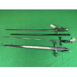 A MASONIC TYLERS' SWORD AND SCABBARD ALONG WITH A DECORATIVE SHORT SWORD AND A TOLEDO STEEL SWORD -