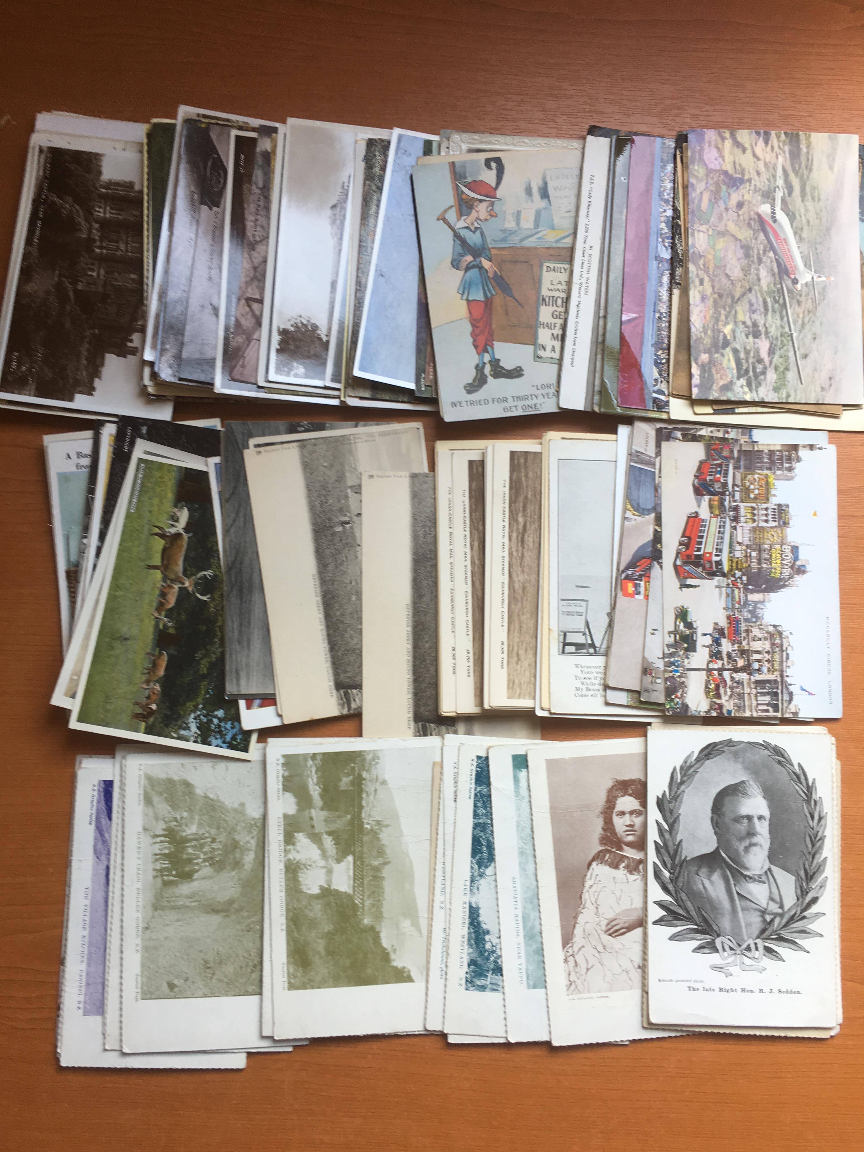 A COLLECTION OF POSTCARDS IN AN ALBUM AND LOOSE, SCOTLAND, SHIPS, NORFOLK, COMIC, HORNING, CHAGFORD,