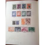 SG "CROWN" KG6 ALBUM WITH A MIXED MINT OR USED COLLECTION INCLUDING BAHAWALPUR, CEYLON, PAKISTAN,