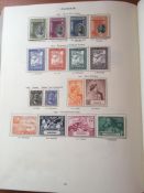 SG "CROWN" KG6 ALBUM WITH A MIXED MINT OR USED COLLECTION INCLUDING BAHAWALPUR, CEYLON, PAKISTAN,