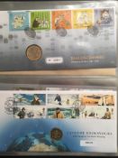 TWO ALBUMS MAINLY ROYAL MAIL/ROYAL MINT COIN AND MEDALLIC COVERS (42)