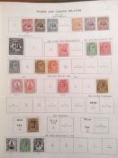 SG NEW IDEAL ALBUM WITH A MIXED MINT AND USED COLLECTION INCLUDING AUSTRALIA, BARBADOS,