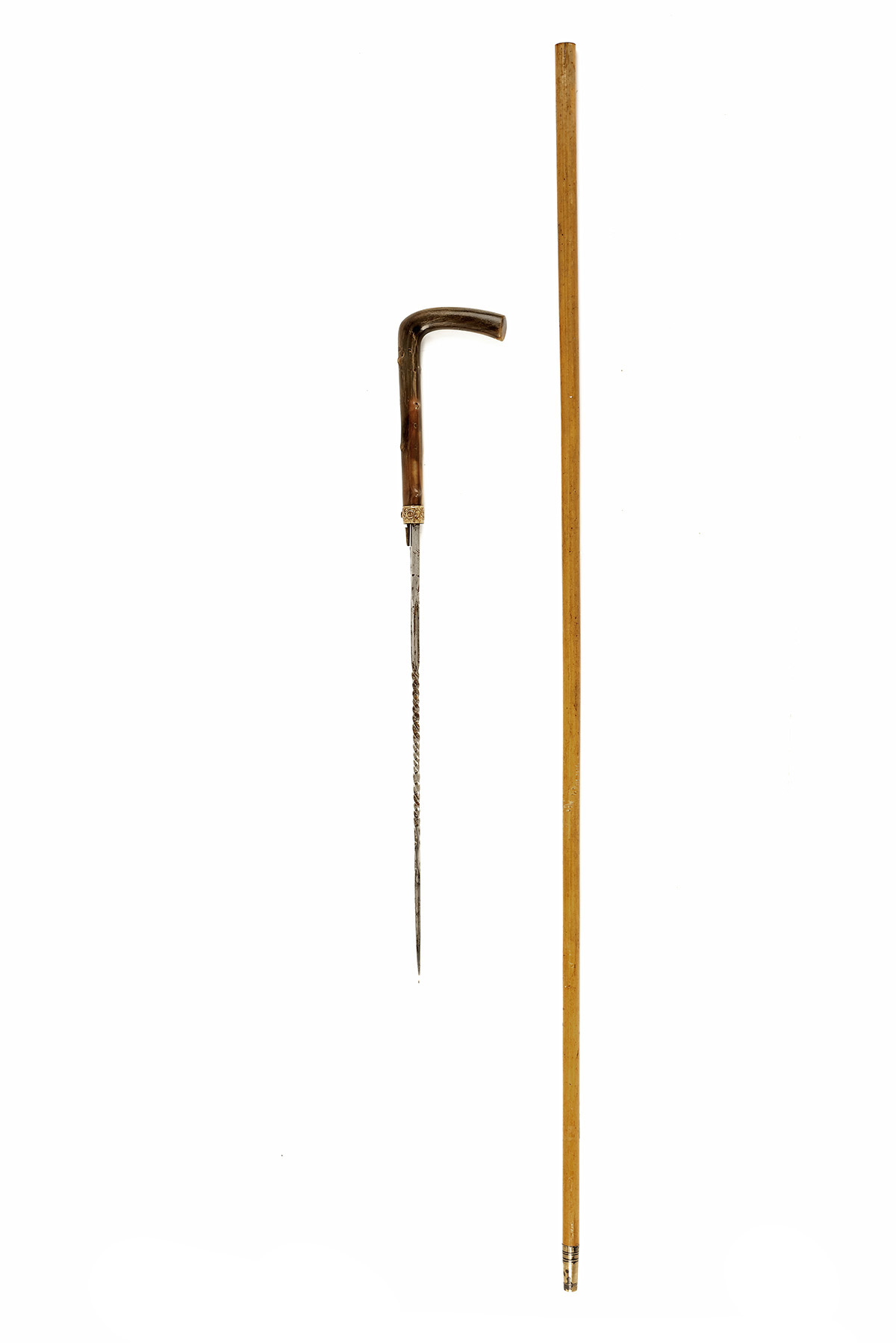 A GOOD LATE GEORGIAN DAGGER-STICK, circa 1810, 33 1/4in. overall with slender cane shaft