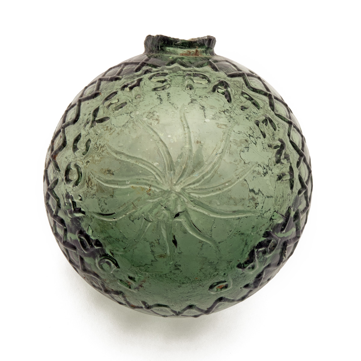 AN EXCEPTIONALLY RARE PALE GREEN GLASS TARGET BALL FOR HOCKEY'S PATENT AUTOMATIC TRAP, circa 1885,
