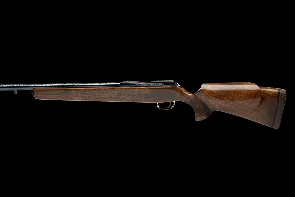 A CASED RARE ISP SPARTAN BOLT-ACTION ENGRAVED CUSTOM PNEUMATIC AIR-RIFLE, serial no. 004 085, - Image 2 of 11