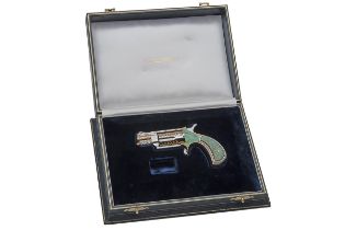 A MAGNIFICENT CASED GOLD, DIAMOND AND ENAMEL-MOUNTED NORTH AMERICAN ARMS .22 VEST REVOLVER, serial