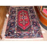 A Middle Eastern rug with geometric border - 180cm