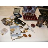 A selection of collectables including flatware, je