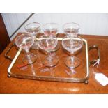 A set of six vintage mid century champagne saucers / coupe glasses bearing retro cocktail artwork an