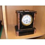 A Victorian slate and marble mantel clock