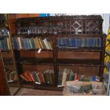 A Victorian carved oak open bookcase - 180cms wide