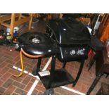 A Laguna Two Burner Gas Barbecue with Side Burner