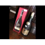 Boxed Remy Martin Cognac together with one other