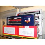 A Hornby boxed locomotive together with others