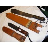 A Martindale machete in leather scabbard together