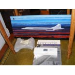 A glass panel painting of Concorde, together with