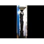 A Tiffany style figural standard lamp with up-ligh