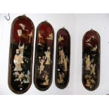 Four Oriental decorative wall plaques depicting do