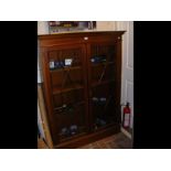 An antique mahogany two door bookcase - 100cms wid