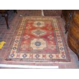 A Middle Eastern rug with geometric border - 180cm