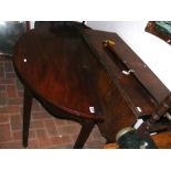 An antique drop leaf table, together with a half r