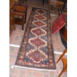 A Middle Eastern style runner - 290cm x 74cm
