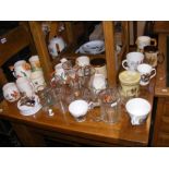 An assortment of hunting motif china and glassware