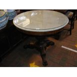 A 19th century circular French marble top table -