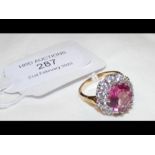 A pink stone dress ring in 9ct gold setting