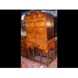 A period walnut chest on stand with triple dome to