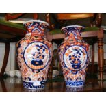 A pair of Oriental floral vases