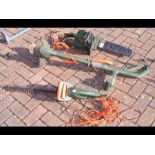 Three Black & Decker items - chainsaw, strimmer an